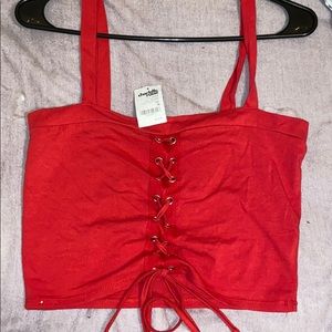 Red lace up crop top.